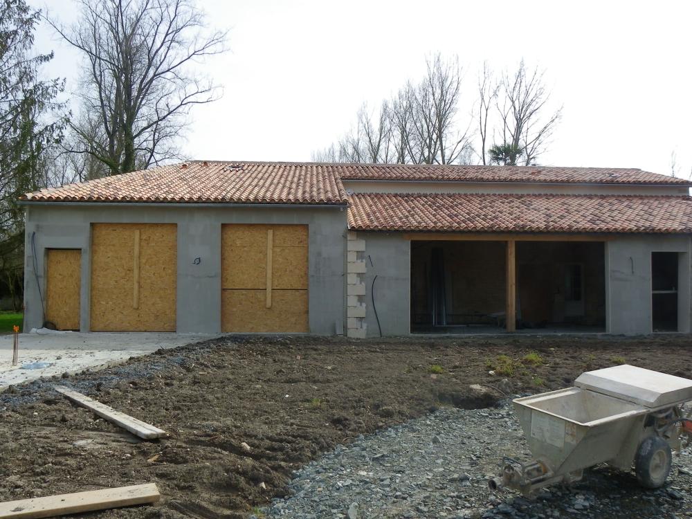 Enduit de façade près de Faye-sur-ardin